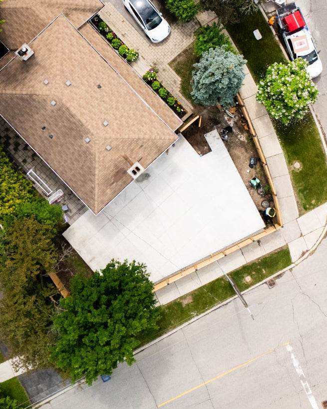 A top down view of hexpro sport tiles by eightynine sports being assembled on a concrete slab pad
