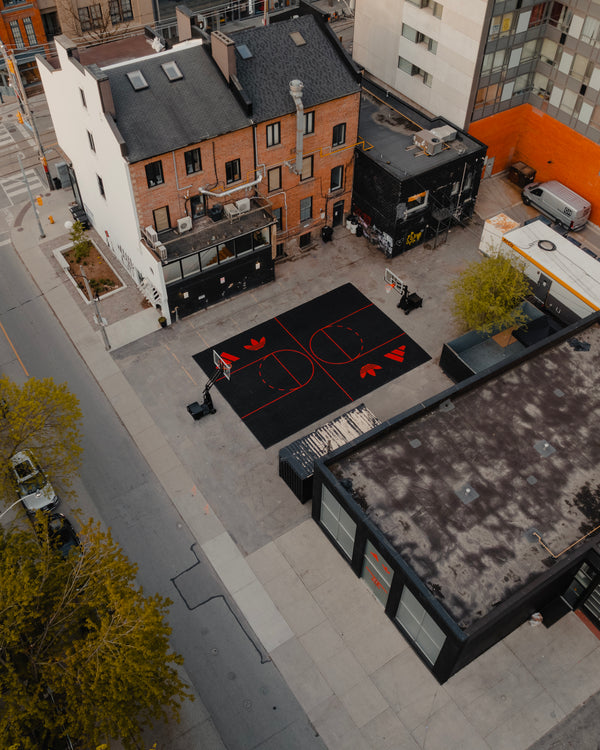 Two CITY HOOPS Traveler basketball hoops used for an Adidas brand activation.