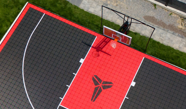 CITY HOOPS Platinum basketball system with backstop netting installed on a private court.