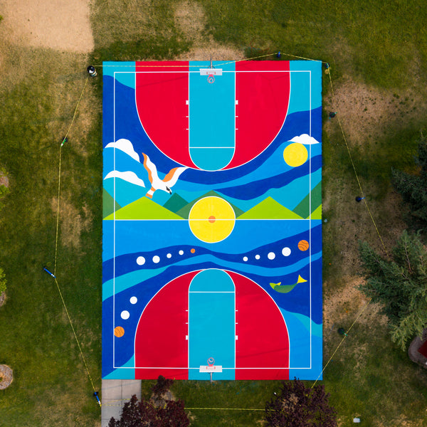 Custom basketball mural court installed by Melissa Cole in Liberty Lake, Washington using Laykold's Standard & Vibrant colors.