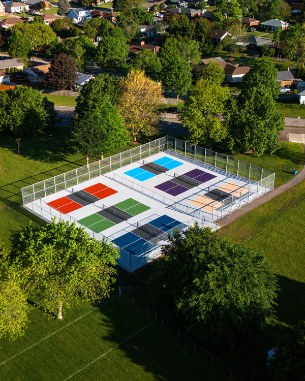 Completed pickleball facility finished in a variety of standard and vibrant court colors.