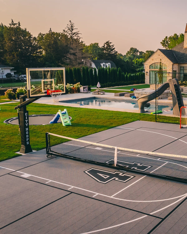 HEXPRO Sport Tile Pickleball Court in a full Platinum Grey Colorway with additional basketball game lines and custom logo.